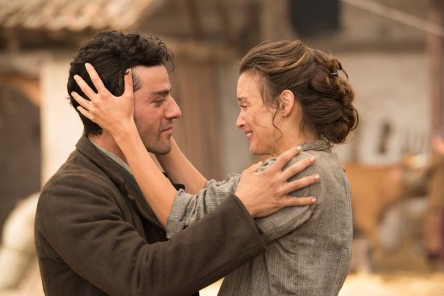 Mikael (Oscar Isaac) and Ana (Charlotte Le Bon). Photo by José Haro for Open Road Films.