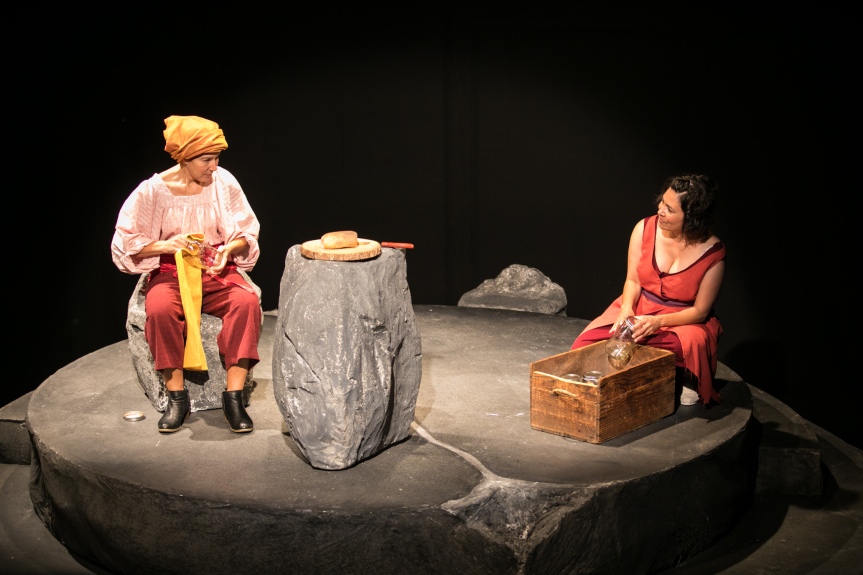 Gesalm (Michele Apriña Leavy) trades life stories with Rena (María Candelaria). Photo by Cheshire Isaacs for Crowded Fire Theater.